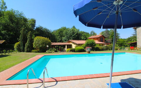 Le Balze: Sky, Plant, Property, Building, Umbrella, Blue, Green, Swimming Pool, Shade, Azure