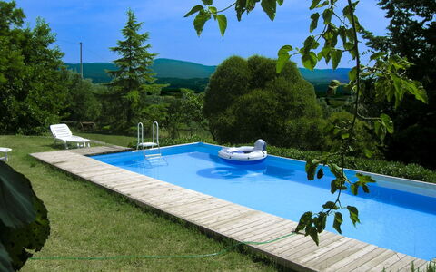 Casa Rossa: Blue, Swimming Pool, Leisure, Garden, Shade, Backyard, Landscaping, Resort, Outdoor Furniture, Lawn