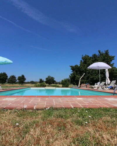 Il Viaggiolo: Sky, Plant, Swimming Pool, Cloud, Tree, Water, Building, Shade, Arecales, Land Lot