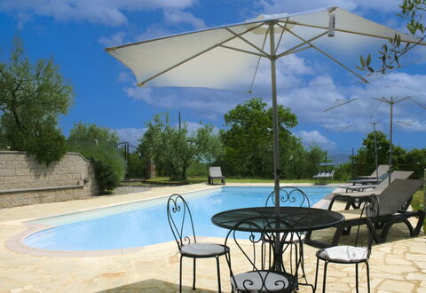 La Rogaia: Umbrella, Furniture, Outdoor Furniture, Shade, Chair, Outdoor Table, Flowerpot, Swimming Pool, Design, Houseplant