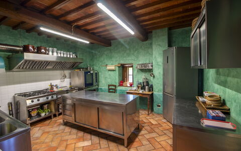 Torre di Vignale: Kitchen, Interior Design, Furniture, Wood, Flooring, Countertop, Lighting, Ceiling, Room, Kitchen Appliance