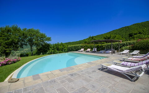 Torre di Vignale: Hill, Swimming Pool, Mountain Range, Outdoor Furniture, Eco Hotel, Flagstone, Resort, Ridge, Landscaping, Tropics