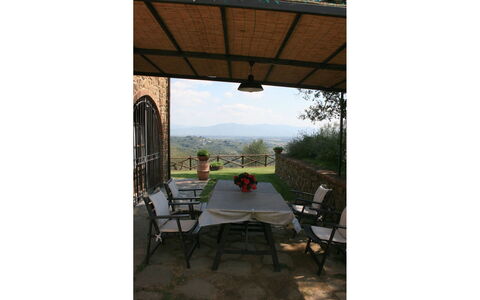 Podere della Crocchia: Sky, Plant, Building, Table, Chair, Porch, Window, Shade, Flowerpot, Tree