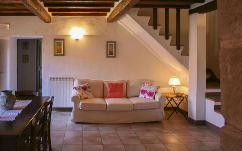 Borgo Antico: Furniture, Interior Design, Flooring, Wall, Floor, Wood, Room, Ceiling, Couch, Living Room