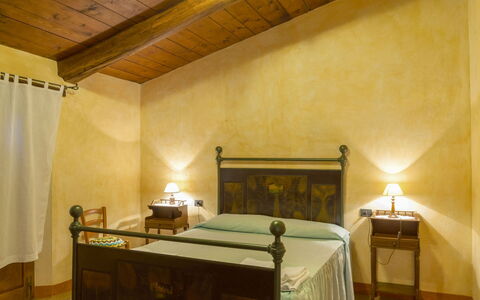 Casa la Primula: Interior Design, Furniture, Flooring, Wall, Floor, Wood, Ceiling, Room, Bed, Bedroom