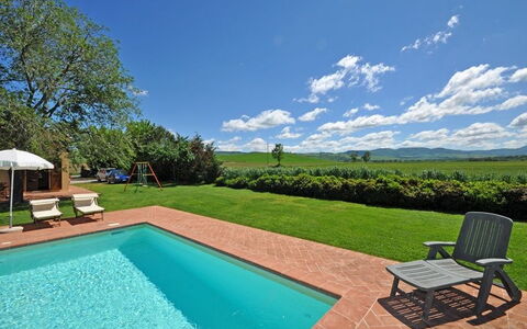 Pienza: Property, Swimming Pool, Real Estate, House, Home, Estate, Grass, Building, Backyard, Residential Area