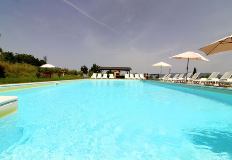 Podere Marcigliano: Water, Sky, Swimming Pool, Plant, Azure, Umbrella, Cloud, Rectangle, Tree, House