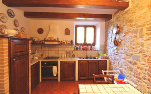 Casa Rosada: Property, Room, Countertop, Building, Furniture, Kitchen, Cabinetry, House, Floor, Interior Design