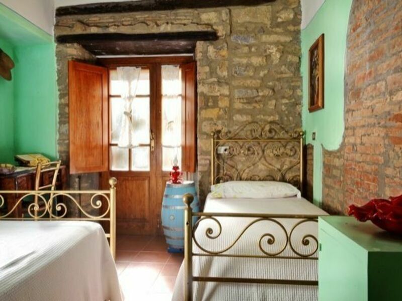 Single beds in apartment Il Suono.