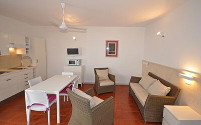 Mitzi 2: Room, Property, Building, Furniture, Interior Design, Floor, Living Room, House, Table, Suite