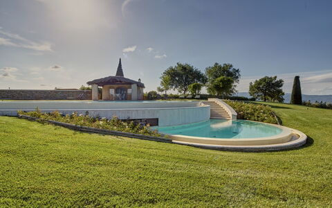 Villa Agazzi: Property, Sky, Architecture, Natural Landscape, House, Grass, Swimming Pool, Estate, Building, Real Estate