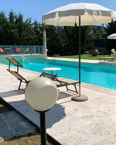Villa Quattro Mori: Water, Furniture, Table, Swimming Pool, Plant, Rectangle, Shade, Chair, Azure, Outdoor Furniture