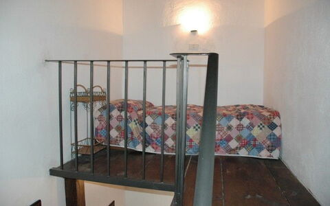 Appartamento Beatrice: Product, Property, Room, Handrail, Furniture, Iron, Bed, House, Stairs, Metal