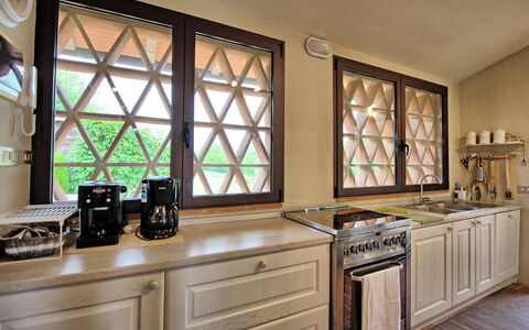 Casa Ovile: Countertop, Cabinetry, Property, Window, Kitchen Appliance, Building, Kitchen, Wood, Kitchen Stove, Drawer