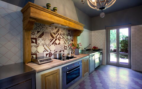 Villa Gubbio: Countertop, Property, Room, Tile, Kitchen, Building, Interior Design, Cabinetry, Furniture, Floor
