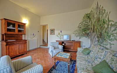 Iris: Room, Furniture, Property, Living Room, Interior Design, Building, House, Real Estate, Home, Floor