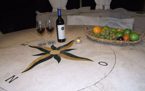Villa Pineta: Table, Tableware, Champagne Stemware, Glass, Stemware, Centrepiece, Food