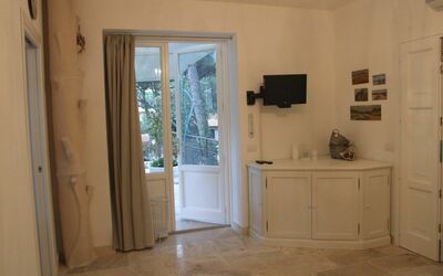 Iris: Room, Property, Floor, Wall, Interior Design, Furniture, Building, Hardwood, Tile, Flooring