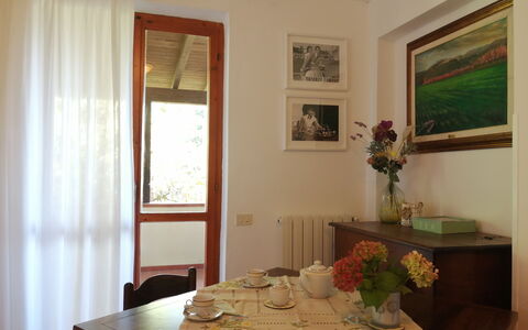 Villa La Quercia: Furniture, Interior Design, Wood, Flooring, Floor, Table, Room, Dining Room, Lighting, Picture Frame