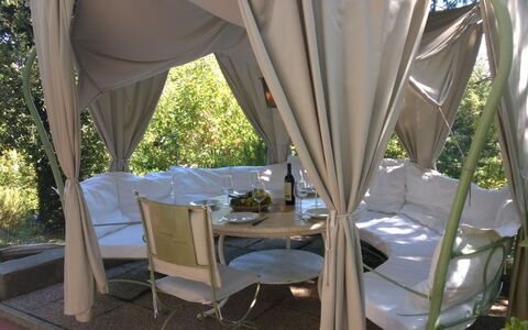 Villa La Quercia: Tent, Property, Room, Chair, Furniture, Canopy, Tree, Shade, House, Real Estate