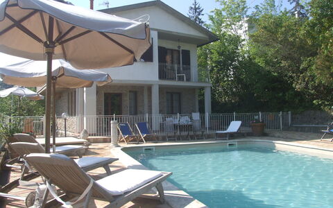 Villa Il Castagno: Water, Property, Plant, Sky, Swimming Pool, Azure, Shade, Outdoor Furniture, Chair, Interior Design